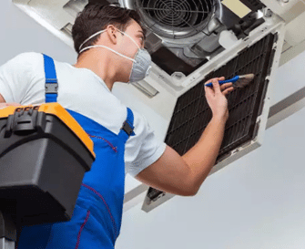 rooftop commercial AC unit repair by professional technician